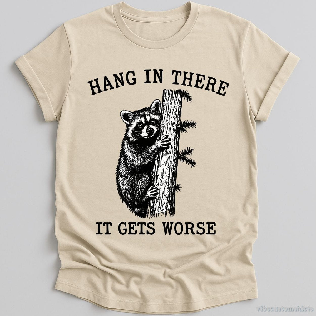 Hang in There It Gets Worse Raccoon T-shirt graphic design — view 3